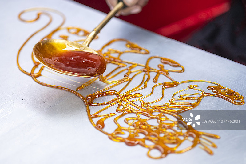 中国传统手艺非遗项目画糖人画糖画特写图片素材