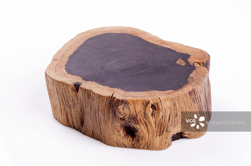 一块乌木截面特写白色背景图片素材