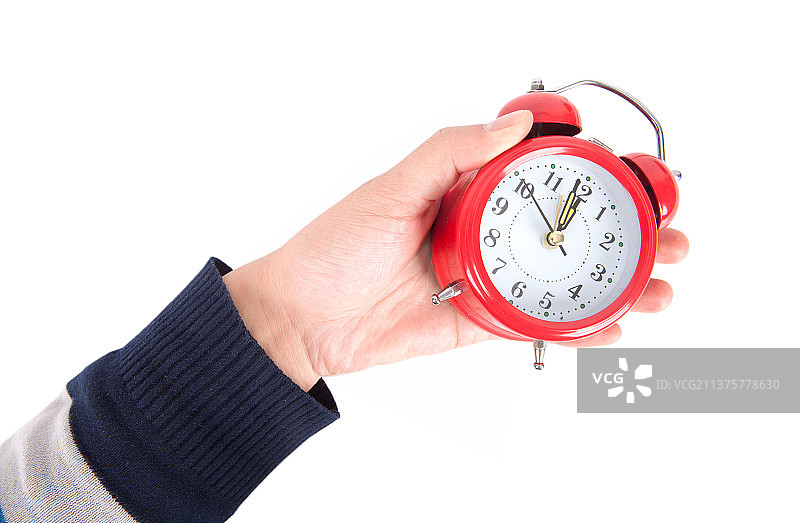 手里拿着闹钟图片素材