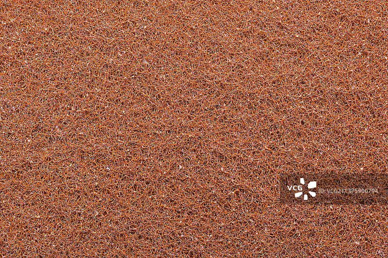 富含铜的海绵百洁布纹理，沙子的完整画面图片素材