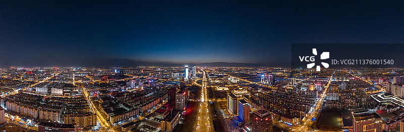 航拍银川主干道北京路和城市天际线夜景图片素材