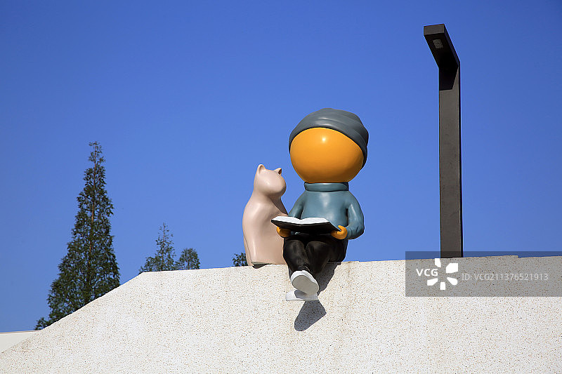 卡通人偶雕塑像景观城市风光图片素材