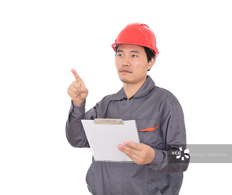 白背景前正在查看相关资料的民工图片素材