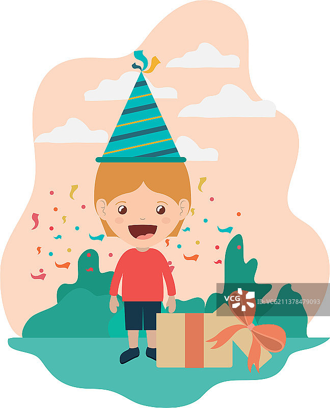 戴着生日帽的男孩在庆祝生日图片素材