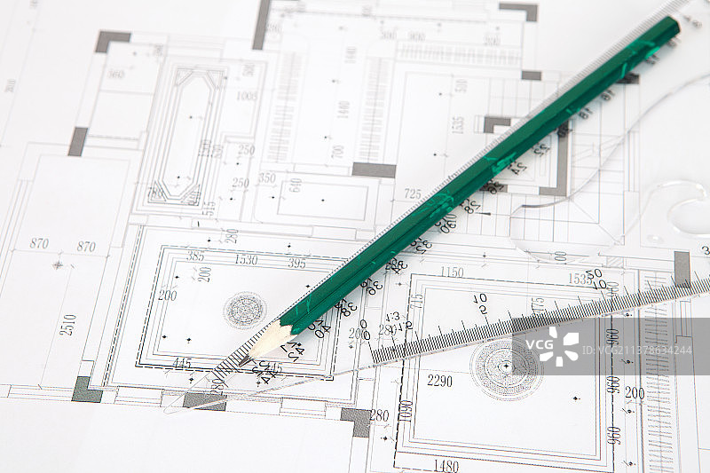 施工图上的尺子和铅笔图片素材