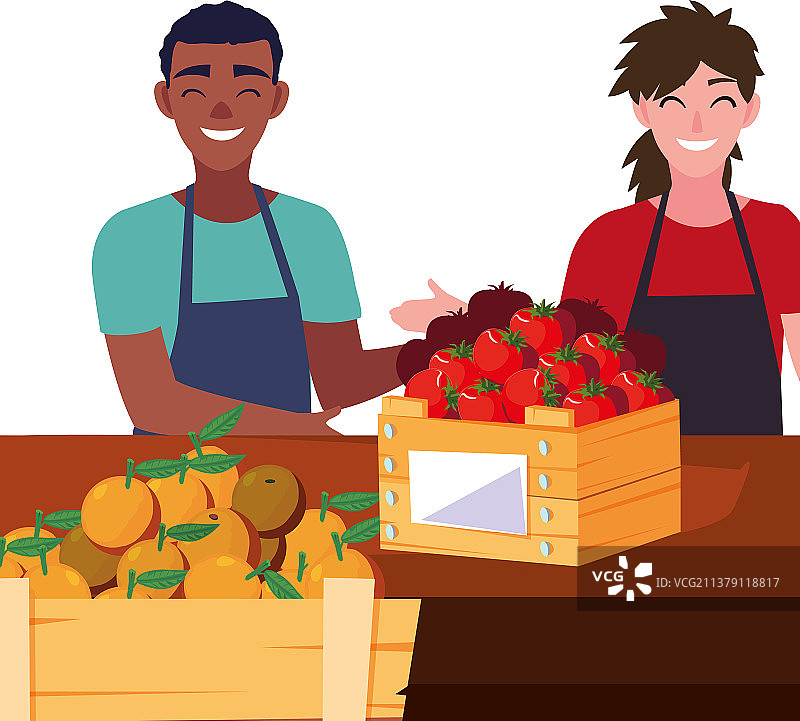 售卖橙子和番茄的男女售货员图片素材