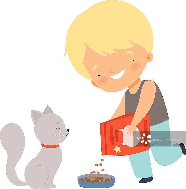 可爱的微笑小男孩喂他的小猫图片素材