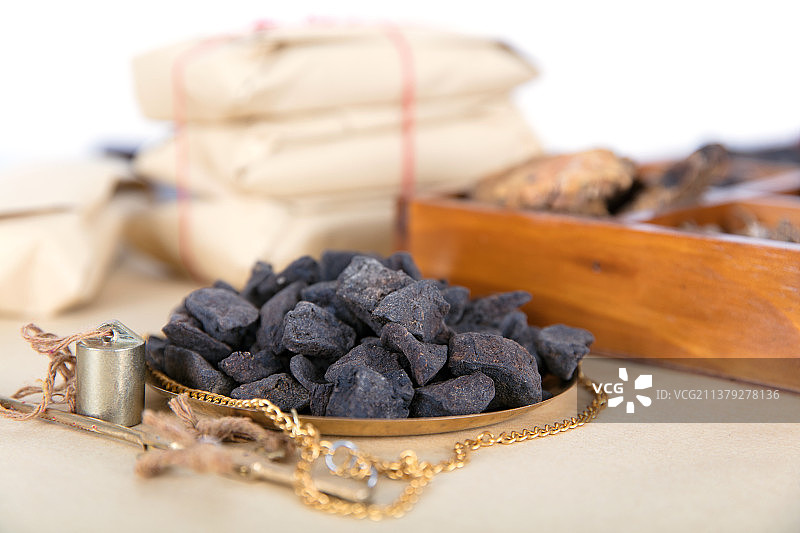 秤盘里的中药何首乌图片素材