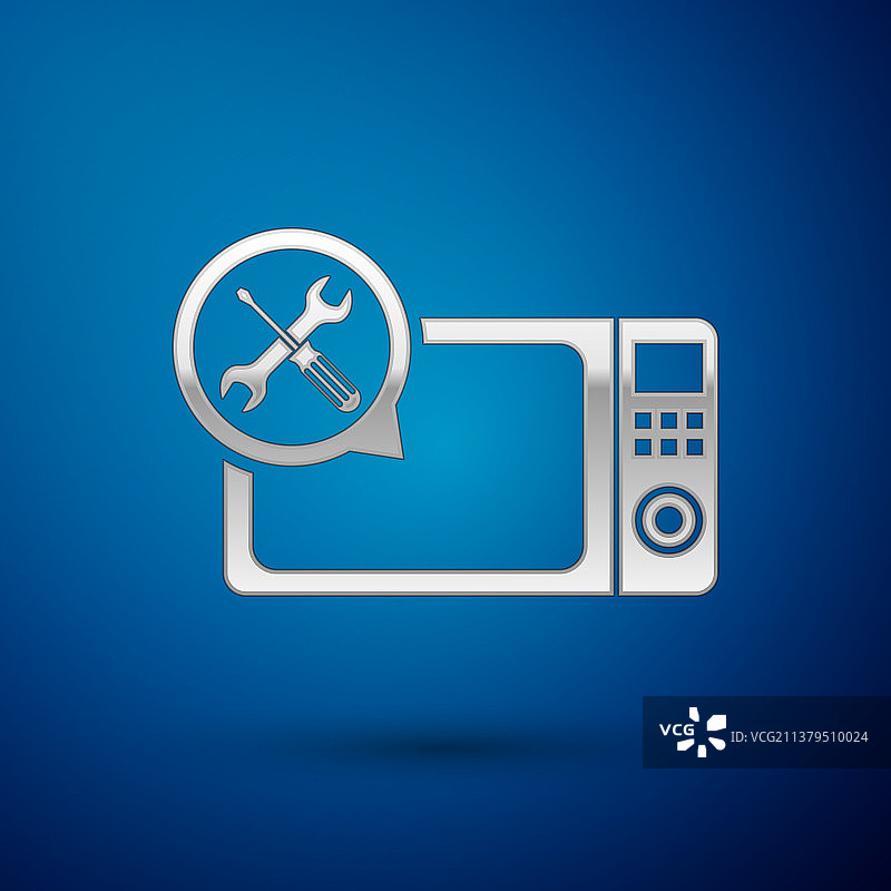 带螺丝刀和扳手的银色微波炉图片素材