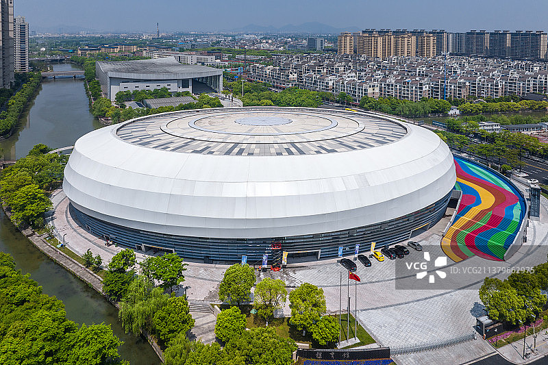 航拍杭州亚运会排球项目比赛场馆绍兴柯桥中国轻纺城体育中心体育馆图片素材