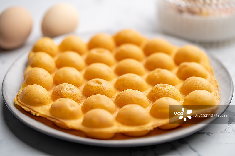 夜市里的港式美味小吃鸡蛋仔图片素材