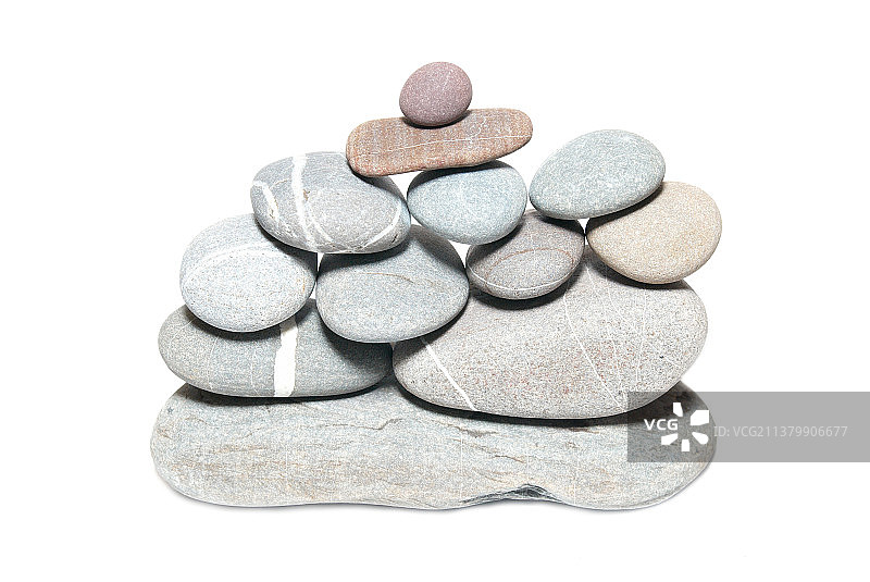 鹅卵石墙，白色背景下的石块特写图片素材