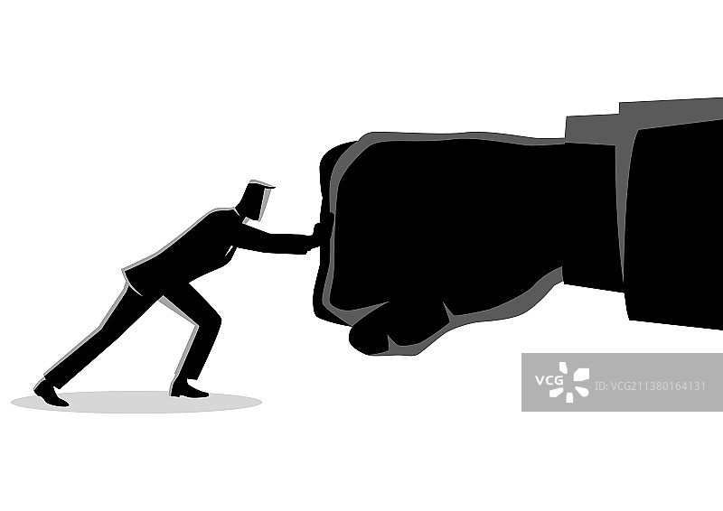 手持巨型拳头的商人图片素材