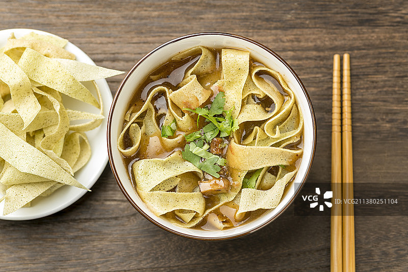 天津传统早餐锅巴菜油条茶叶蛋特写图片素材
