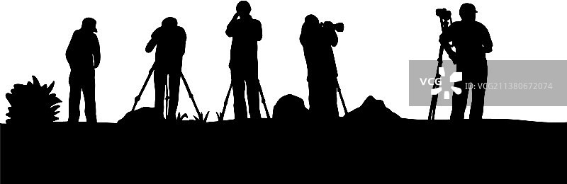 摄影师拍照剪影图片素材