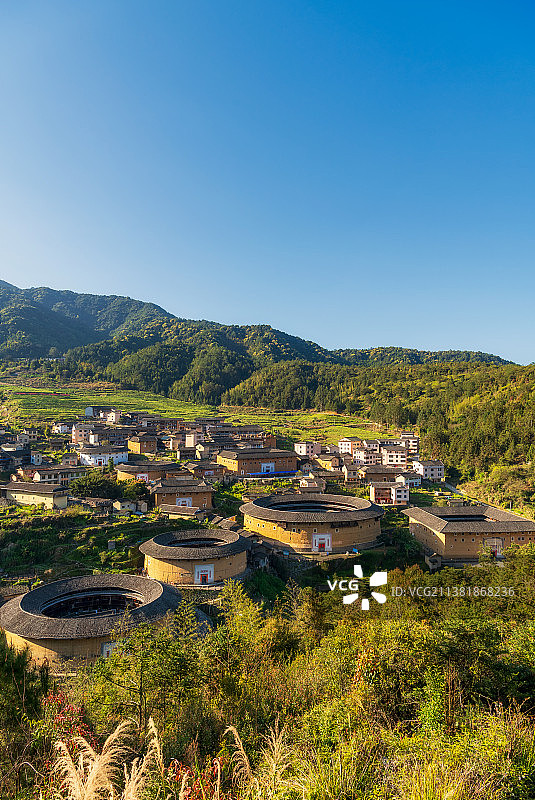 世界文化遗产、福建省龙岩市永定初溪土楼群春季户外风光观景台视角图片素材