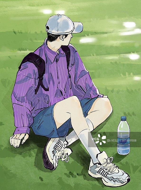 阳光下坐在草地上休息的青春少年图片素材