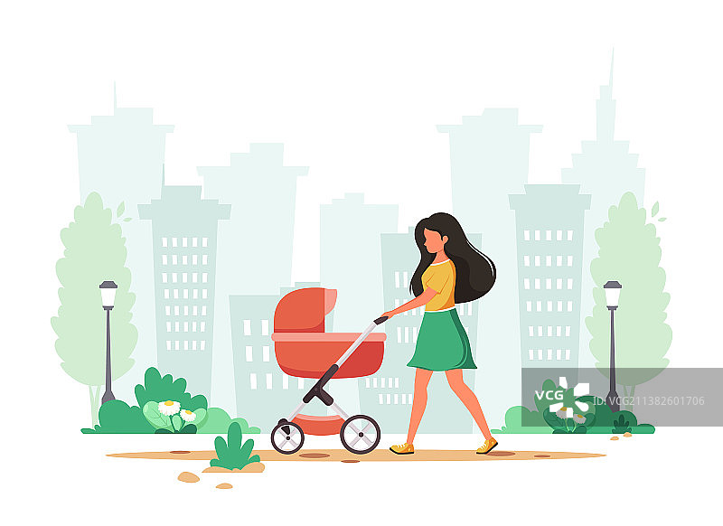 春天里推着婴儿车行走的女人图片素材