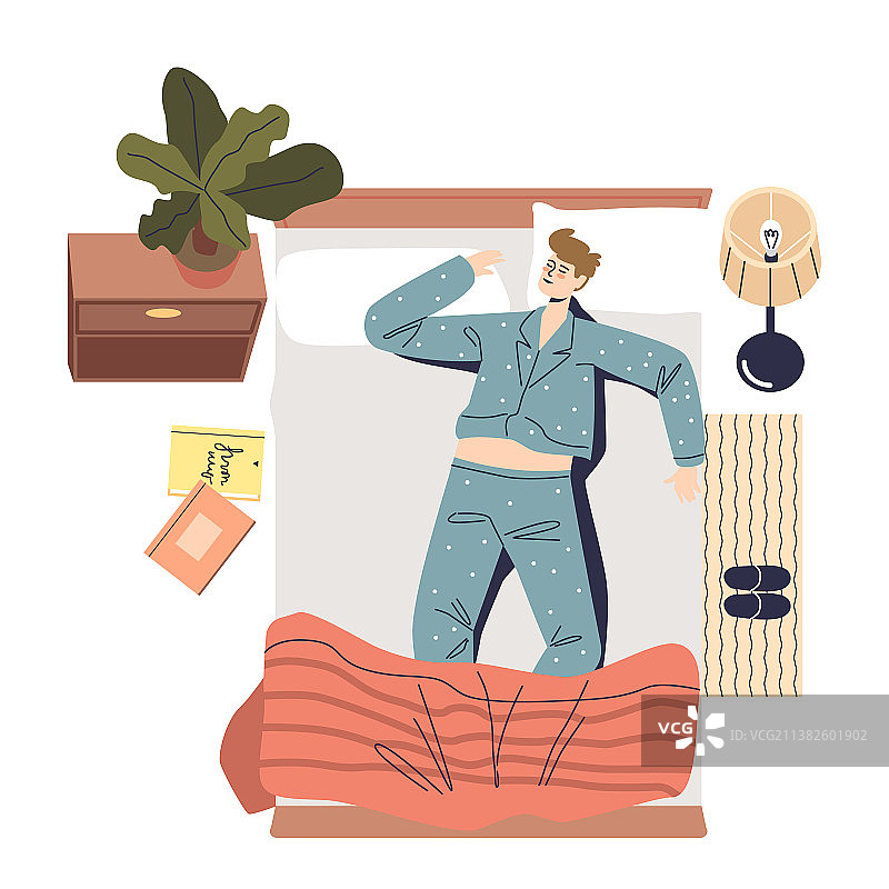 穿着睡衣在舒适的床上睡觉的年轻男人图片素材