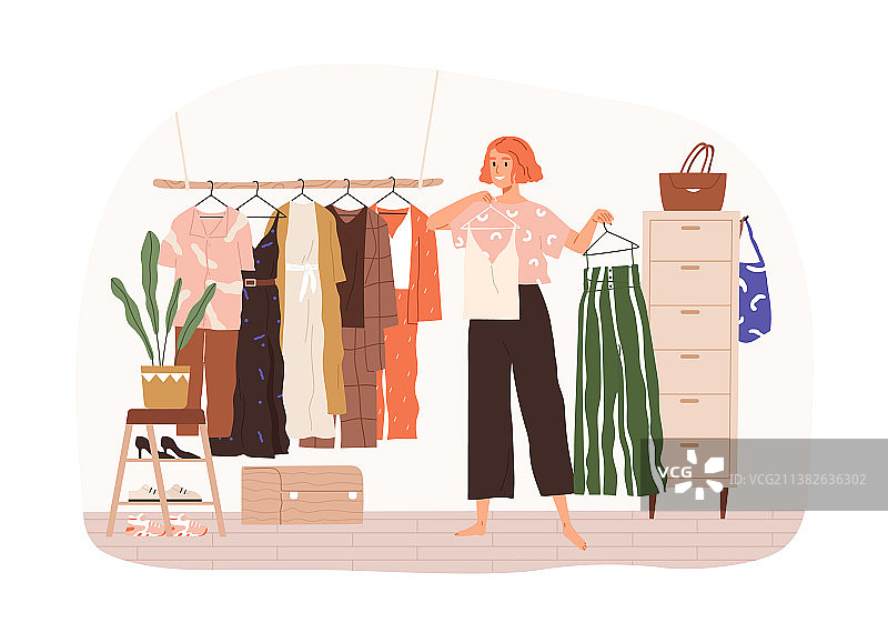 女人在衣柜前拿着衣架图片素材