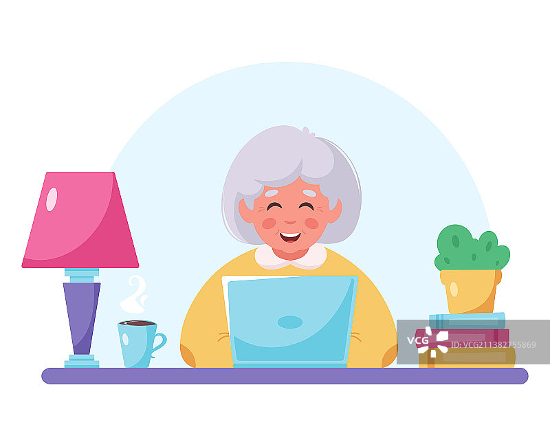 奶奶坐着使用笔记本电脑图片素材
