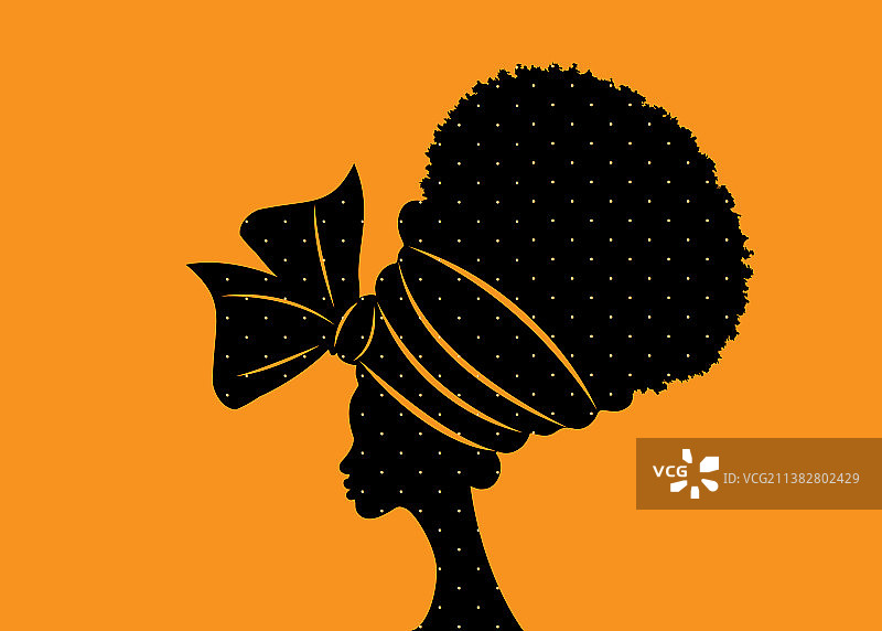 戴圆点头巾的漂亮非洲女性肖像图片素材