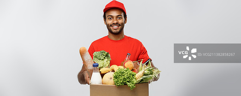 配送概念：英俊的非洲裔美国配送员图片素材