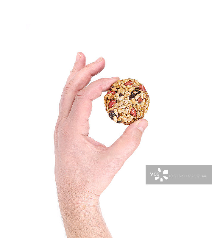 手拿糖渍花生葵花籽，摩尔多瓦图片素材