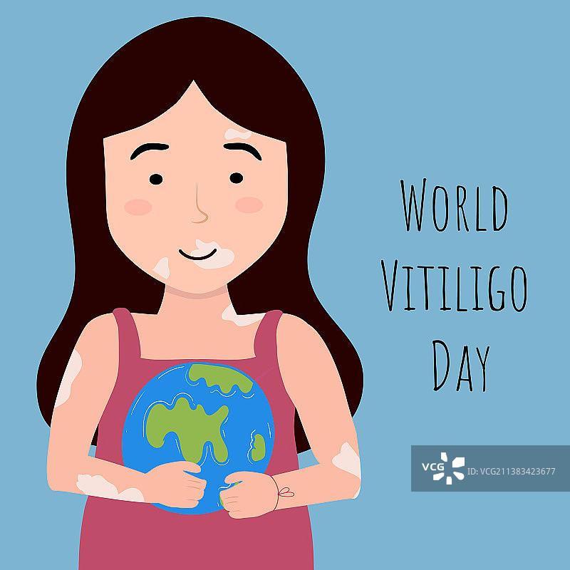 患有白癜风的年轻女孩手持地球仪图片素材