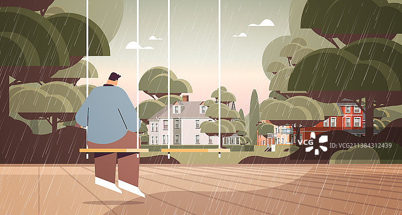 坐在公园秋千上的沮丧男人图片素材