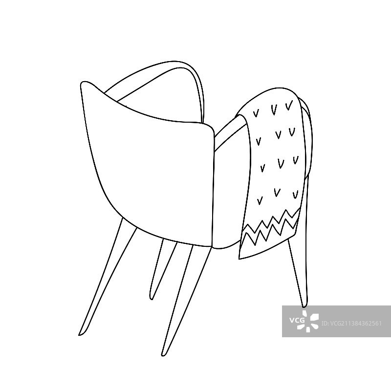 盖着毯子的舒适扶手椅图片素材