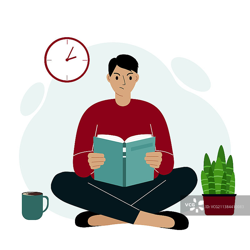 翘着二郎腿生气的年轻男人在看书图片素材