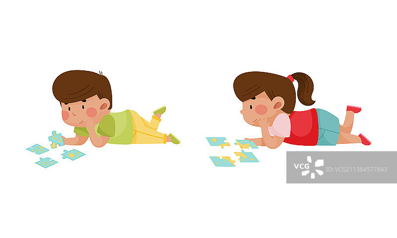 小男孩和女孩在玩拼图图片素材
