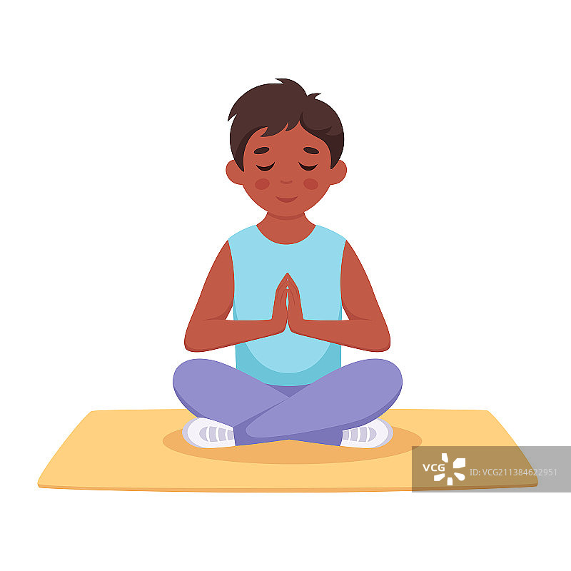 男孩以莲花姿势冥想图片素材
