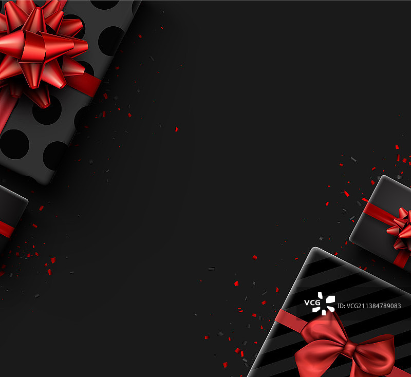 带红色蝴蝶结的黑色半遮礼品盒图片素材