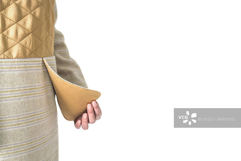 暖金色连衣裙细节特写，俄罗斯图片素材