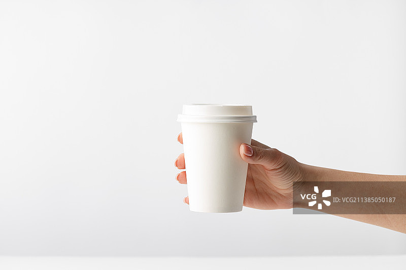手持咖啡杯图片素材