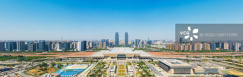 河南郑州高铁站郑州东站都市风光城市天际线夏季户外航拍视角全景图片素材