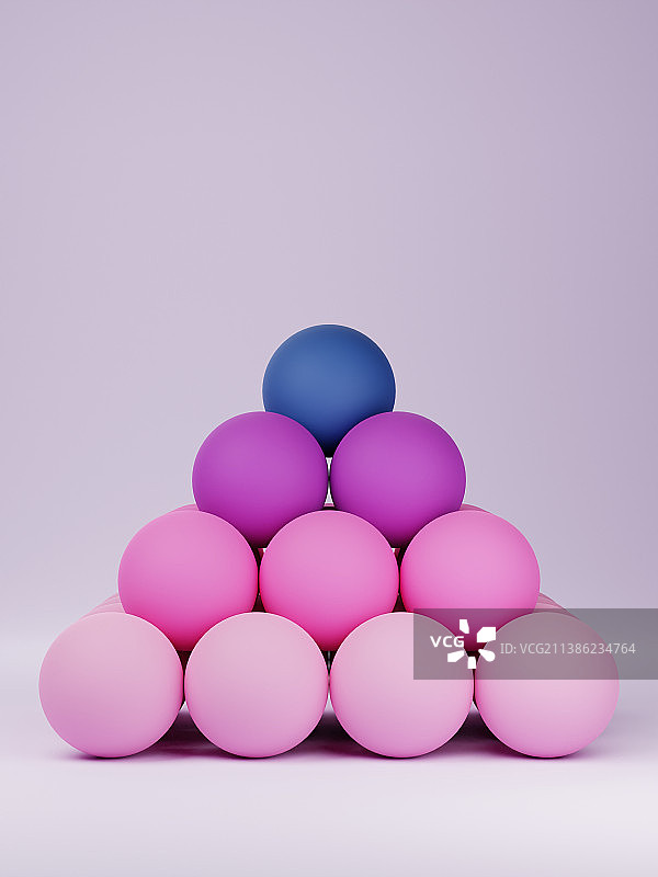 白色背景下堆叠成金字塔的紫色球体特写图片素材