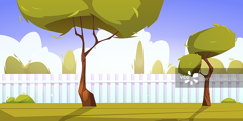 有绿树和白色栅栏的房屋后院图片素材