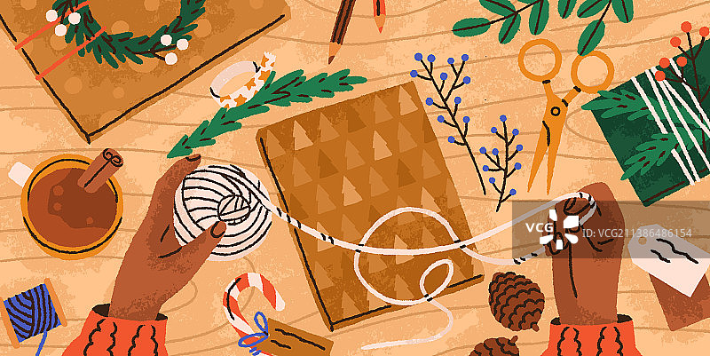 双手用盒子准备DIY圣诞礼物图片素材