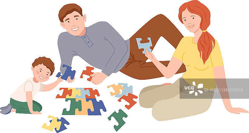 父母和儿子坐在地板上玩耍图片素材