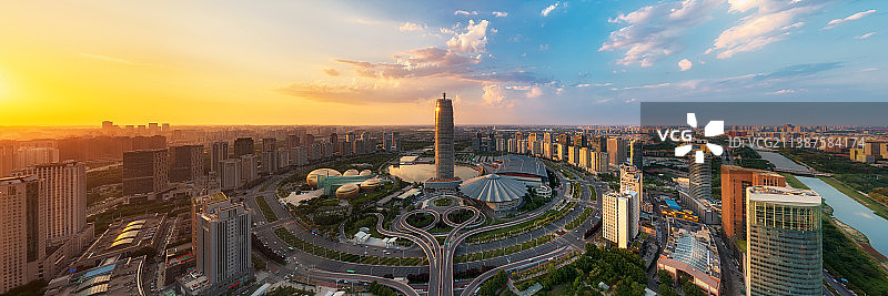 河南郑州CBD城市风光与都市天际线夏季日落时分户外航拍图片素材