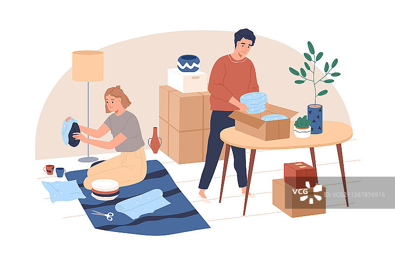 人们将物品装入纸箱图片素材