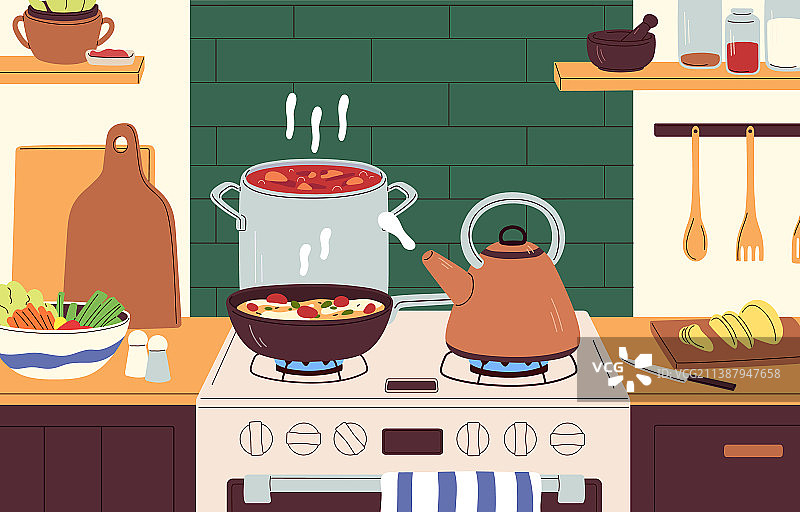 燃气灶上的煎锅、锅具和茶壶图片素材