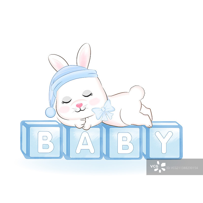 睡在玩具箱上的可爱小兔子图片素材