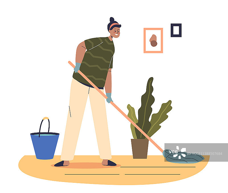 年轻女管家拖地图片素材