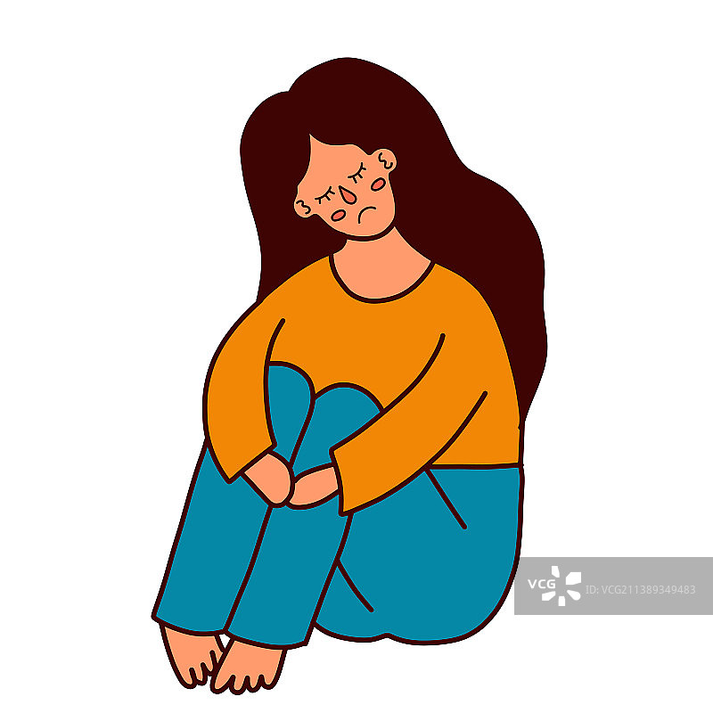 悲伤的女孩抑郁地抱着膝盖图片素材