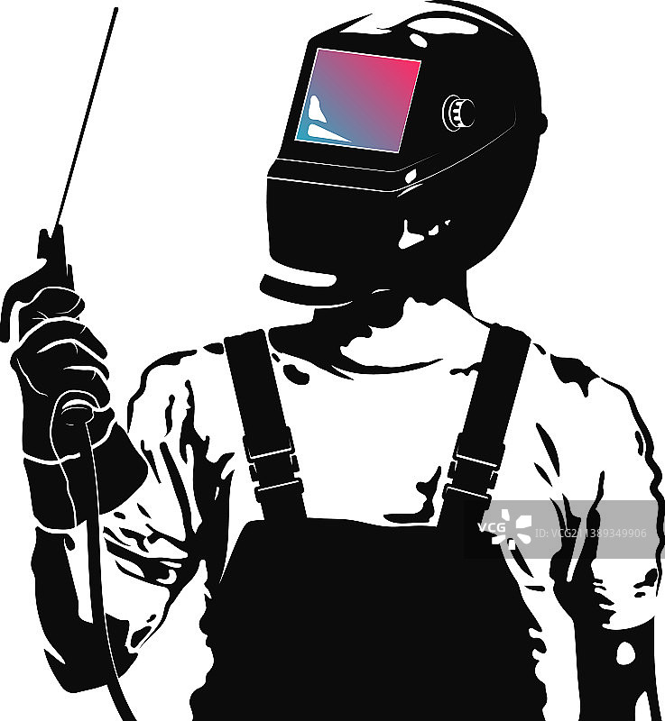 戴面罩的焊接工人在焊接机器旁图片素材