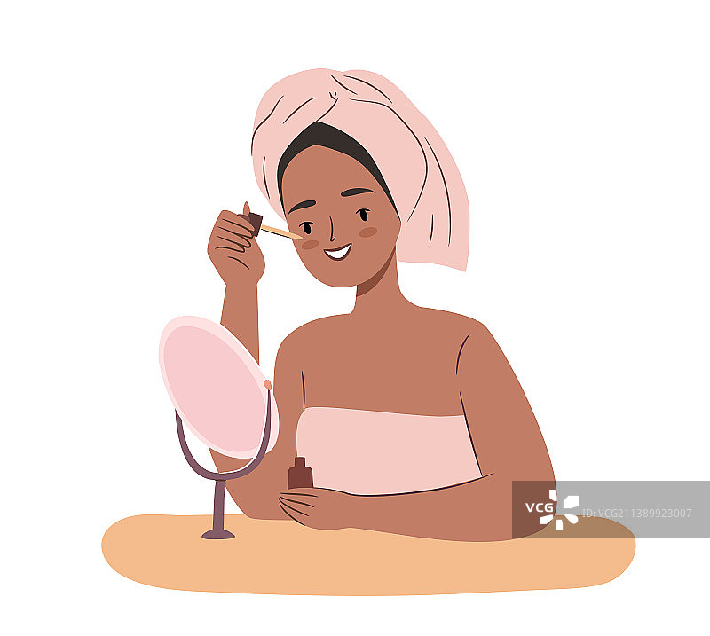 可爱的非洲女人每天使用面部精华图片素材